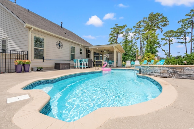 1715 Lake Egret Dr, North Myrtle Beach, SC 29582 - outdoor pool featuring a patio area and a ceiling fan
