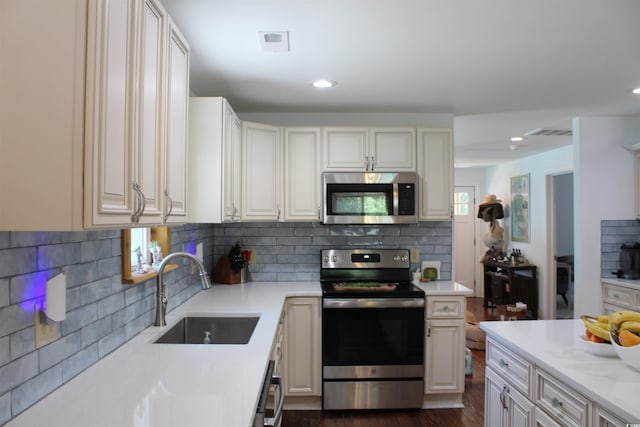 1600 Beaver Rd, Myrtle Beach, SC 29577 - kitchen featuring stainless steel appliances, decorative backsplash, recessed lighting, and dark wood-style flooring