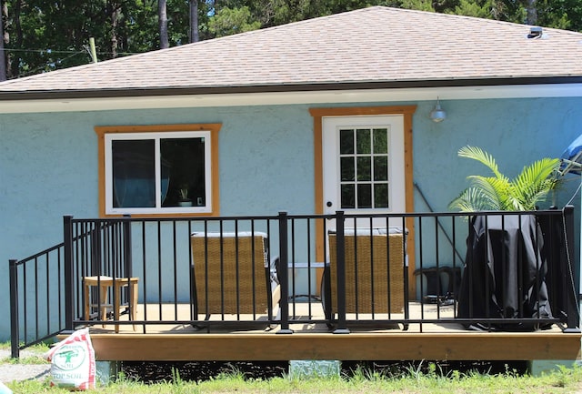 1600 Beaver Rd, Myrtle Beach, SC 29577 - rear view of house with roof with shingles and stucco siding