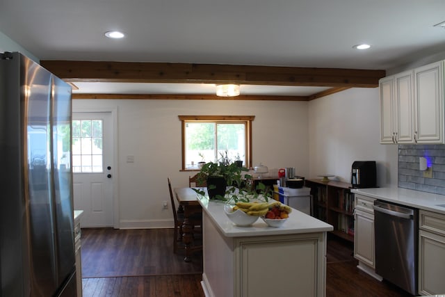 1600 Beaver Rd, Myrtle Beach, SC 29577 - kitchen featuring appliances with stainless steel finishes, plenty of natural light, light countertops, beamed ceiling, and recessed lighting