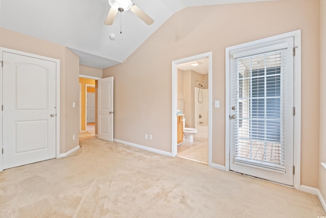 1654 Low Country Pl Unit C, Myrtle Beach, SC 29577 - unfurnished bedroom featuring carpet floors, lofted ceiling, connected bathroom, access to exterior, and a ceiling fan