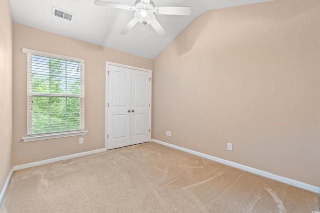 1654 Low Country Pl Unit C, Myrtle Beach, SC 29577 - unfurnished bedroom featuring vaulted ceiling, carpet floors, ceiling fan, and a closet