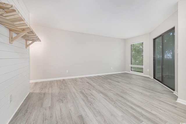 1500 Cenith Dr Unit B-403, North Myrtle Beach, SC 29582 - unfurnished living room with light wood finished floors and baseboards