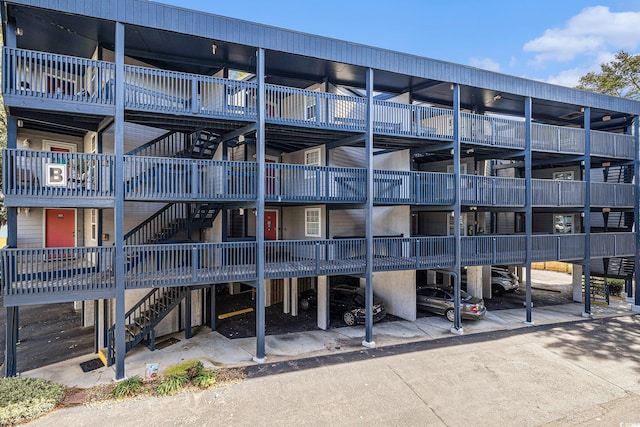 1500 Cenith Dr Unit B-403, North Myrtle Beach, SC 29582 - view of apartment building / complex with stairway and covered parking