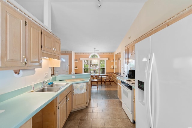 556 Crusade Cir, Conway, SC 29526 - kitchen featuring white appliances, light countertops, light brown cabinets, pendant lighting, and vaulted ceiling