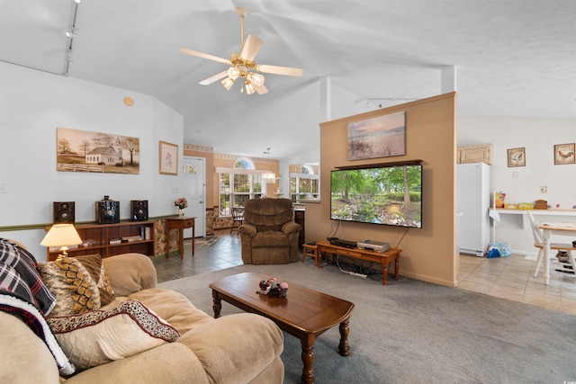 556 Crusade Cir, Conway, SC 29526 - living room with vaulted ceiling, light tile patterned floors, a ceiling fan, light carpet, and rail lighting