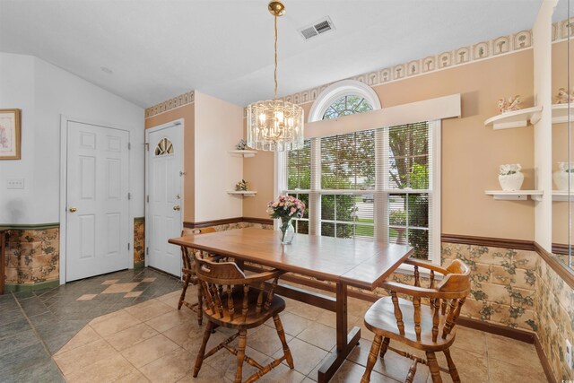 556 Crusade Cir, Conway, SC 29526 - dining room with wainscoting, vaulted ceiling, and a chandelier