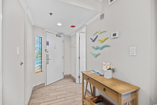 4800 S Ocean Blvd Unit 1524, North Myrtle Beach, SC 29582 - entrance foyer with ornamental molding, light wood-style floors, and recessed lighting