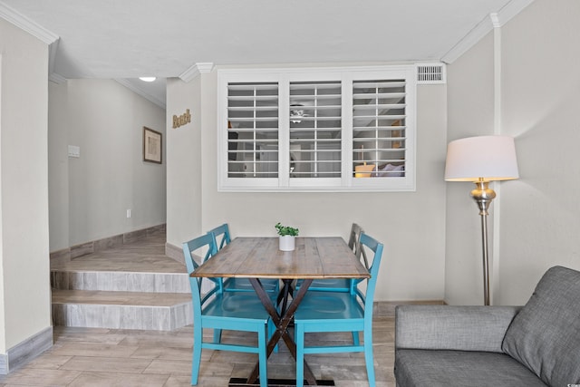 4800 S Ocean Blvd Unit 1524, North Myrtle Beach, SC 29582 - dining room featuring crown molding and wood finished floors