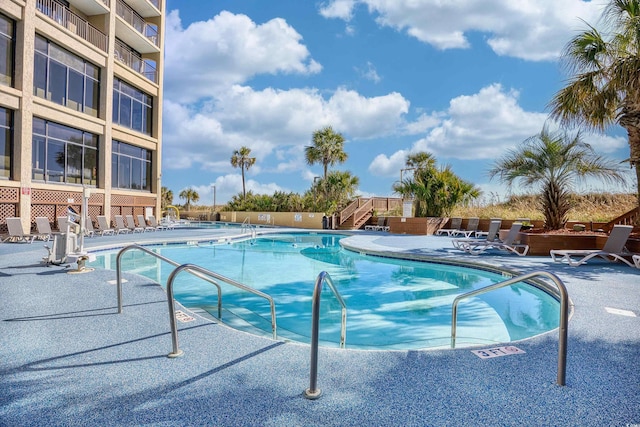 4800 S Ocean Blvd Unit 1524, North Myrtle Beach, SC 29582 - community pool featuring a patio area and stairway