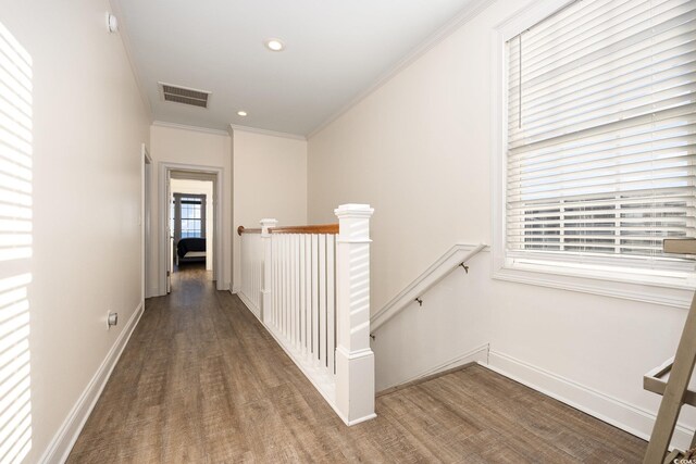 611 N Ocean Blvd, Surfside Beach, SC 29575 - hallway featuring an upstairs landing, wood finished floors, crown molding, and recessed lighting