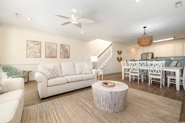 611 N Ocean Blvd, Surfside Beach, SC 29575 - living area featuring a ceiling fan, ornamental molding, stairs, recessed lighting, and wood finished floors
