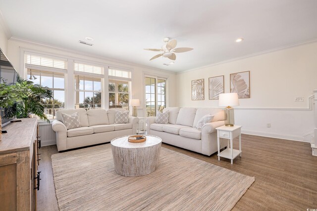 611 N Ocean Blvd, Surfside Beach, SC 29575 - living area with ceiling fan, crown molding, wood finished floors, and recessed lighting