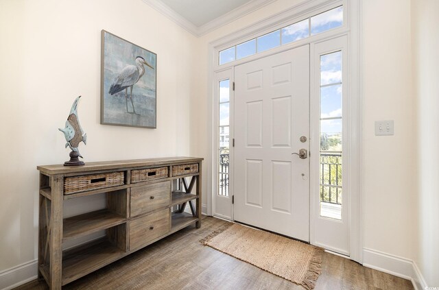 611 N Ocean Blvd, Surfside Beach, SC 29575 - foyer entrance with wood finished floors and crown molding