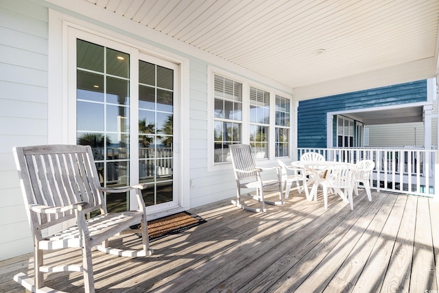 611 N Ocean Blvd, Surfside Beach, SC 29575 - porch featuring outdoor dining space