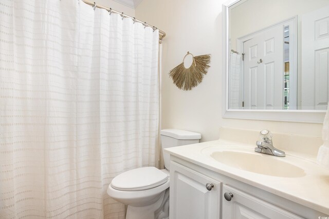 611 N Ocean Blvd, Surfside Beach, SC 29575 - bathroom featuring vanity and toilet