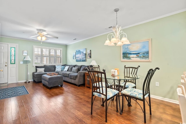 611 2nd Ave S Unit 18-C, North Myrtle Beach, SC 29582 - dining space featuring wood finished floors, a chandelier, ceiling fan, and ornamental molding