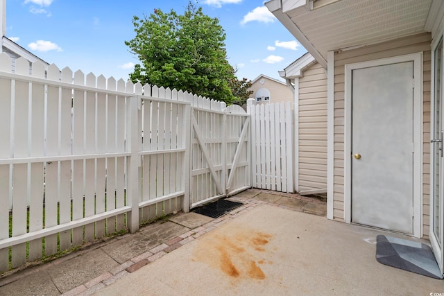 611 2nd Ave S Unit 18-C, North Myrtle Beach, SC 29582 - view of patio with a gate