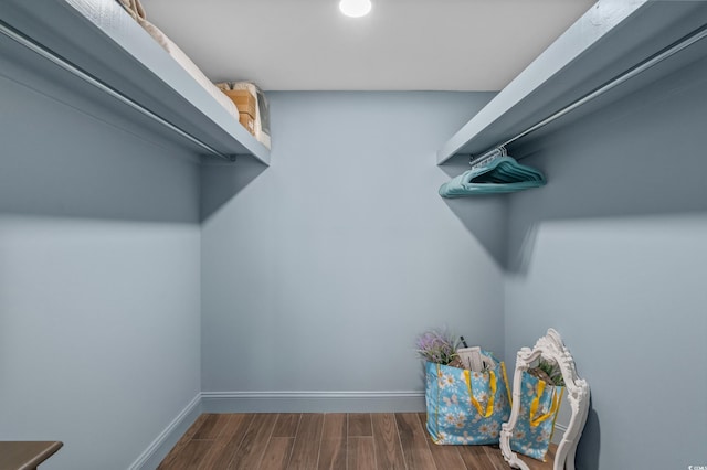 7601 N Ocean Blvd Unit 7-C, Myrtle Beach, SC 29572 - spacious closet featuring dark wood finished floors