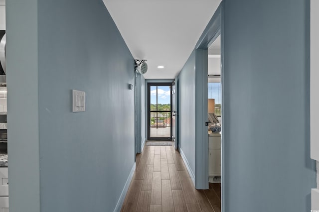7601 N Ocean Blvd Unit 7-C, Myrtle Beach, SC 29572 - corridor featuring baseboards and dark wood finished floors