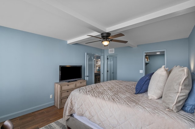 7601 N Ocean Blvd Unit 7-C, Myrtle Beach, SC 29572 - bedroom with beamed ceiling, wood finished floors, and a ceiling fan