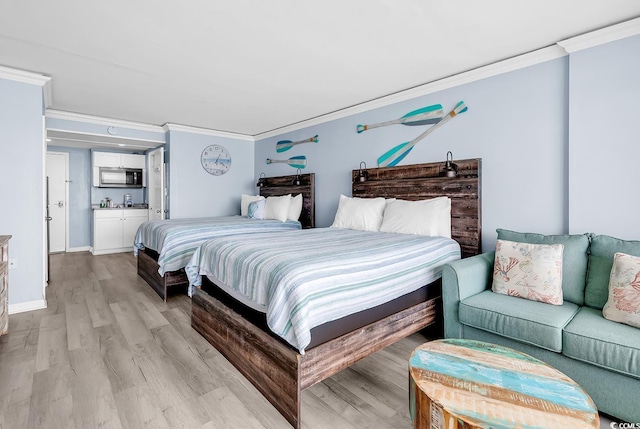 201 74th Ave N Unit 2534, Myrtle Beach, SC 29572 - bedroom with crown molding and light wood finished floors