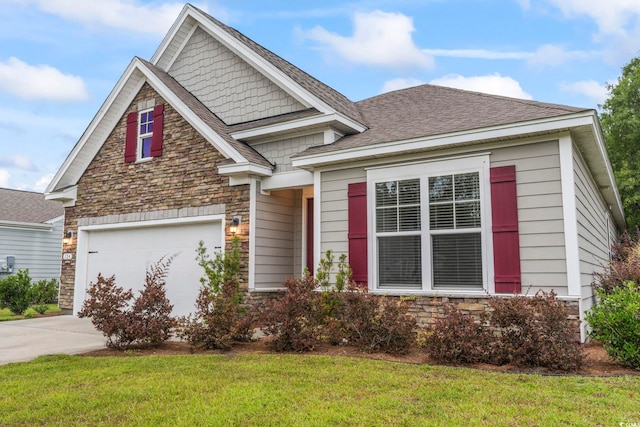 124 Castaway Key Dr, Pawleys Island, SC 29585 - view of front facade with concrete driveway, stone siding, a garage, and a front lawn