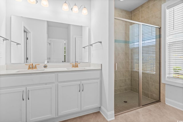 124 Castaway Key Dr, Pawleys Island, SC 29585 - bathroom featuring double vanity, a stall shower, and tile patterned flooring