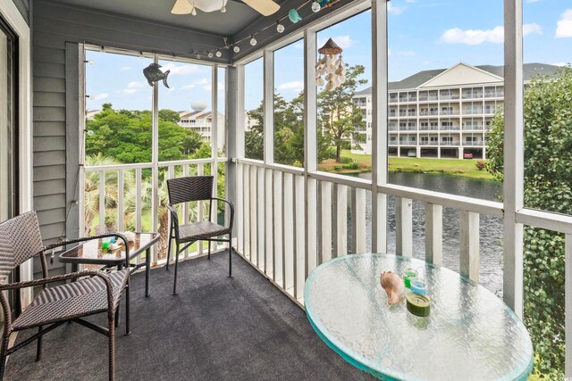 305 Hillside Dr N Unit 205, North Myrtle Beach, SC 29582 - sunroom featuring ceiling fan and a water view