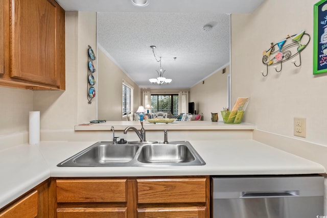 305 Hillside Dr N Unit 205, North Myrtle Beach, SC 29582 - kitchen featuring dishwasher, brown cabinets, light countertops, a textured ceiling, and a chandelier