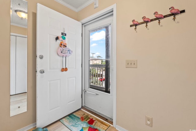 305 Hillside Dr N Unit 205, North Myrtle Beach, SC 29582 - entryway featuring ornamental molding and light wood finished floors