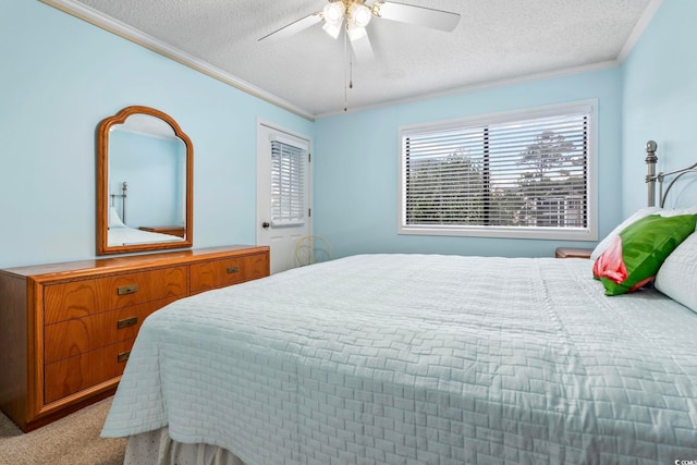 305 Hillside Dr N Unit 205, North Myrtle Beach, SC 29582 - bedroom featuring crown molding, a textured ceiling, carpet, and ceiling fan