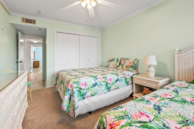 305 Hillside Dr N Unit 205, North Myrtle Beach, SC 29582 - carpeted bedroom with crown molding, a closet, a ceiling fan, and a textured ceiling