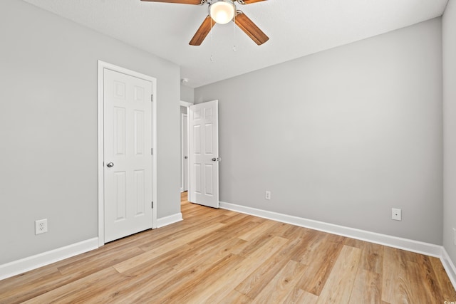 2965 Mount Olive Rd, Loris, SC 29569 - unfurnished bedroom featuring light wood-style flooring and a ceiling fan