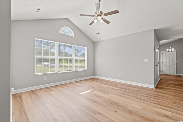 2965 Mount Olive Rd, Loris, SC 29569 - spare room featuring lofted ceiling, ceiling fan, a chandelier, and light wood finished floors