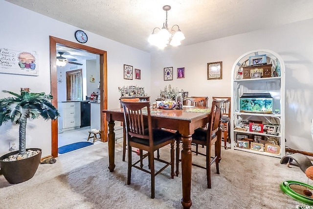 404 72nd Ave N Unit 301, Myrtle Beach, SC 29572 - dining space with carpet flooring, a chandelier, and a textured ceiling
