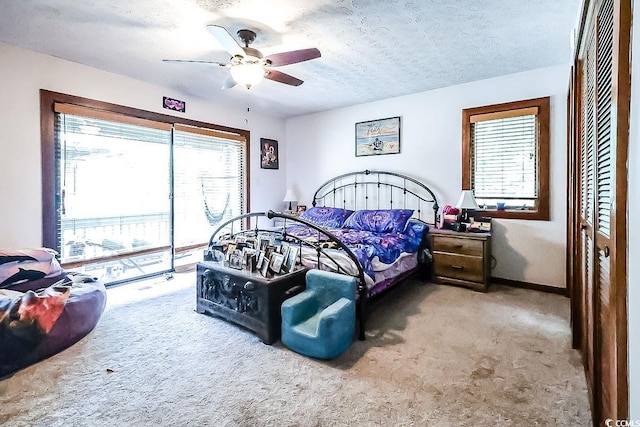 404 72nd Ave N Unit 301, Myrtle Beach, SC 29572 - carpeted bedroom with a closet, a textured ceiling, and ceiling fan