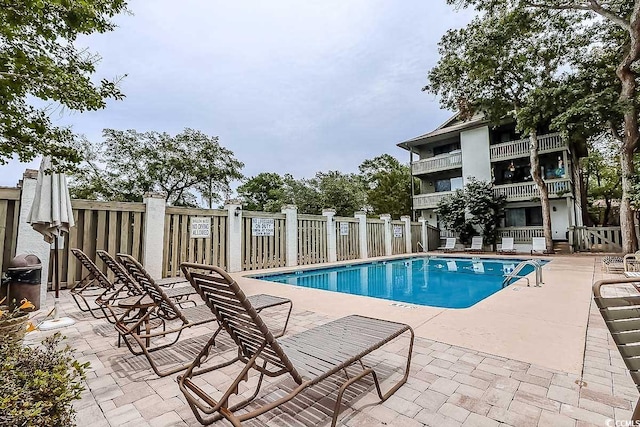 404 72nd Ave N Unit 301, Myrtle Beach, SC 29572 - community pool featuring a patio