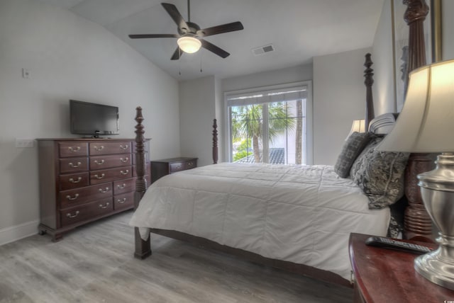 2180 Waterview Dr Unit 738, North Myrtle Beach, SC 29582 - bedroom featuring light wood-style flooring, vaulted ceiling, and a ceiling fan