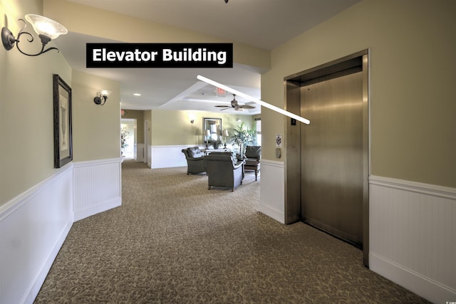 2180 Waterview Dr Unit 738, North Myrtle Beach, SC 29582 - hall featuring a wainscoted wall, carpet, plenty of natural light, and elevator