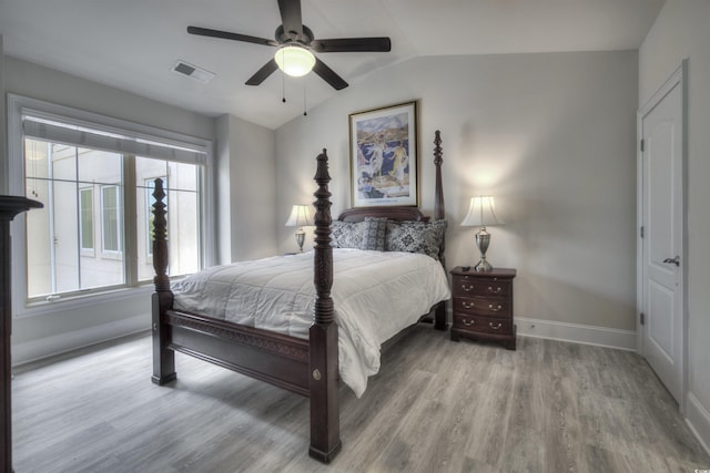 2180 Waterview Dr Unit 738, North Myrtle Beach, SC 29582 - bedroom featuring lofted ceiling, wood finished floors, and ceiling fan