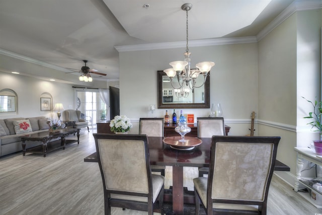 2180 Waterview Dr Unit 738, North Myrtle Beach, SC 29582 - dining room featuring a chandelier, wood finished floors, ornamental molding, and ceiling fan