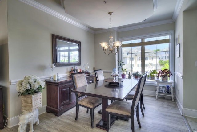 2180 Waterview Dr Unit 738, North Myrtle Beach, SC 29582 - dining area with healthy amount of natural light, light wood-style flooring, a chandelier, and crown molding
