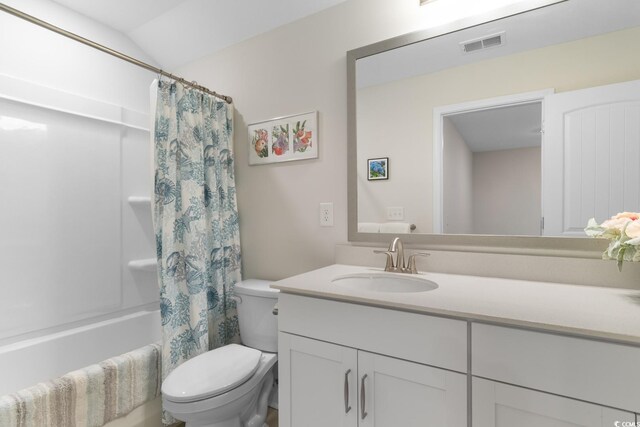 3185 Viceroy Loop, Little River, SC 29566 - bathroom featuring vanity, shower / bathtub combination with curtain, and vaulted ceiling