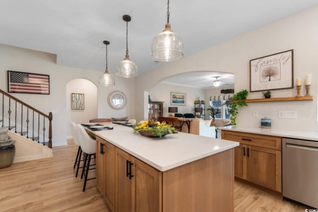3185 Viceroy Loop, Little River, SC 29566 - kitchen featuring dishwasher, arched walkways, and light wood-style floors