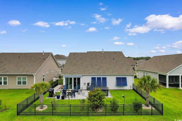 3185 Viceroy Loop, Little River, SC 29566 - back of property with a patio area, a fenced backyard, and a shingled roof