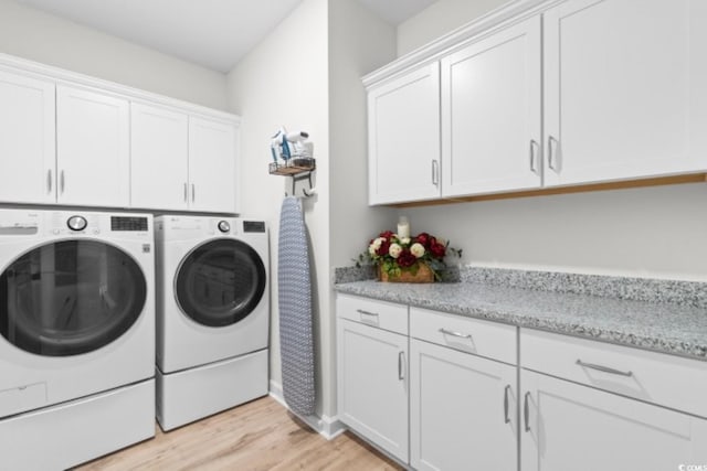 3185 Viceroy Loop, Little River, SC 29566 - laundry area featuring cabinet space, washing machine and dryer, and light wood-style floors