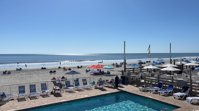 9550 Shore Dr Unit 1733, Myrtle Beach, SC 29579 - community pool featuring view of water and beach
