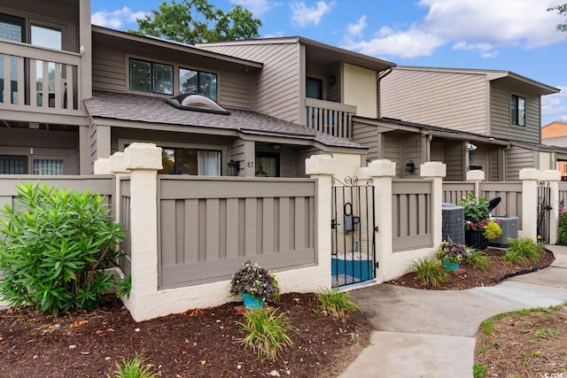 620 15th Ave S Unit 87, Surfside Beach, SC 29575 - view of front of home with a gate and a fenced front yard