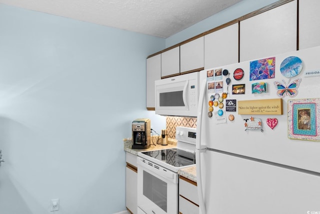 620 15th Ave S Unit 87, Surfside Beach, SC 29575 - kitchen with white appliances, backsplash, light countertops, white cabinetry, and a textured ceiling